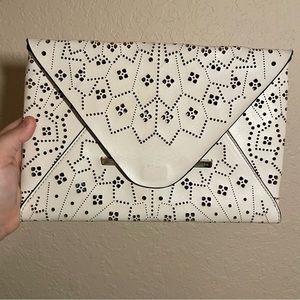 BCBG cream envelope clutch